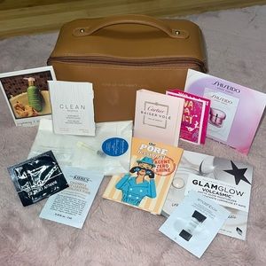 Make up bag with top handle and samples Shiseido, kiehls, Cartier and more